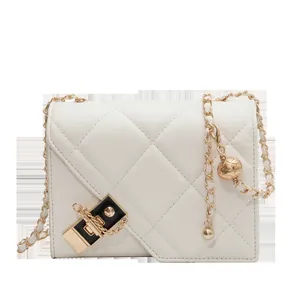 Elegant white quilted chain shoulder bag with gold clasp and decorative metal ball charm