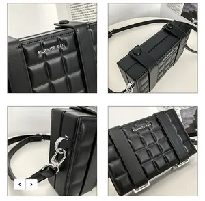 Macro view of black quilted box bag with FILWHITE BAG logo and silver hardware