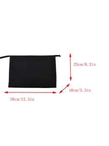 Détail d'un sac de bureau en toile noire affichant les dimensions 38x25x10cm et fermeture