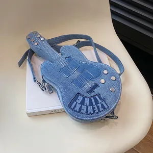 Unique guitar-shaped denim crossbody bag with silver rivets and vintage patchwork design
