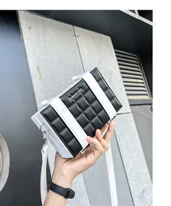 Detail of checkered black and white box bag showing the silver hook and Filwhite logo