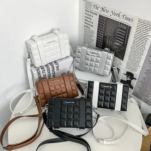 Quilted mini square crossbody bags in multiple colors featuring modern minimalist design