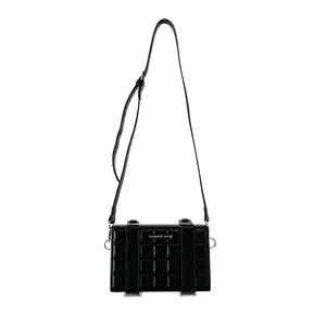 Modern black quilted box crossbody bag with silver hardware and adjustable strap