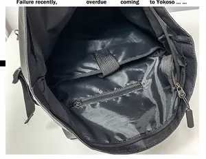 Vista interna dello zaino nero con scomparto imbottito per laptop e tasca con zip