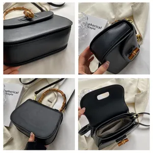 Vues détaillées d'un sac en cuir noir avec poignée vintage en bambou et fermoir rotatif