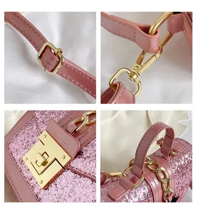 Detailed views of pink glitter crossbody bag with gold-tone hardware and chain strap