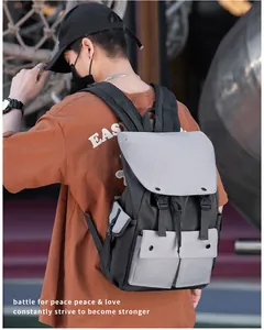Close-up of durable gray and black nylon backpack with double buckle flap closure