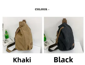 Detailsicht der Khaki und schwarzen Canvas-Umhängetaschen mit Lederbesatz und Reißverschluss