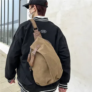 Brown canvas crossbody bag with vintage style and wide strap for men's outdoor casual wear