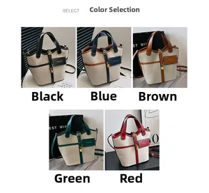 Detail view of colorful canvas bucket bags with PU leather trim and metal lock charms