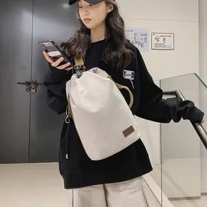 Borsa a tracolla retrò in tela beige con tracolla marrone regolabile per l'uso quotidiano