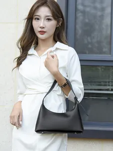 Minimalist black leather underarm bag with adjustable metal buckle for summer fashion