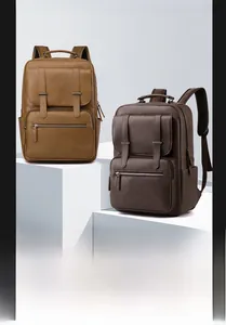 Detail of vintage leather backpack showing large capacity for 15.6 inch laptop