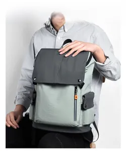 Detail of a casual travel backpack with waterproof nylon fabric and metal buckle closure