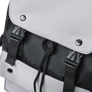Close-up of durable nylon backpack showing buckle, adjustable strap and drawstring detail