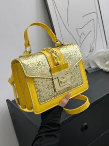 Chic yellow crossbody bag with gold sequins, square buckle and metallic chain handle