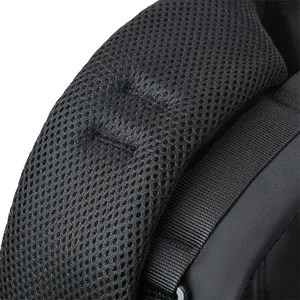 Detail of breathable mesh shoulder strap and reinforced nylon stitching on backpack