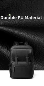 Close-up of durable black PU leather fabric with litchi texture on a large business backpack
