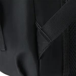 Macro detail of reinforced stitching on nylon backpack shoulder strap and mesh padding