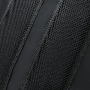 Close-up of black breathable honeycomb mesh padding on ergonomic backpack back