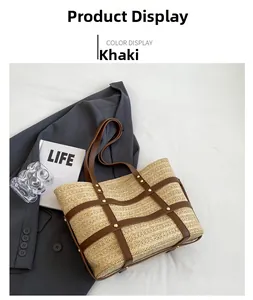 Detail of khaki straw tote bag with brown leather hollow grid and metal rivets