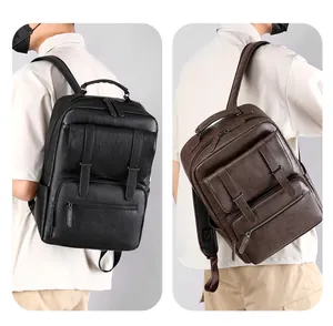 Detail of lychee textured leather backpacks in black and coffee for business use