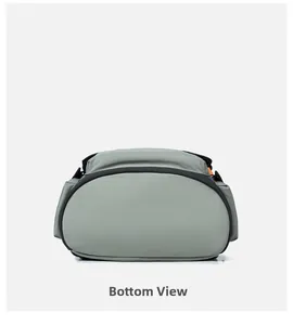 Detailed bottom view of gray-green casual backpack showing durable reinforced edges