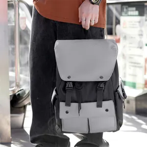 Close-up of a large capacity nylon laptop backpack with buckle flap and grey-black design