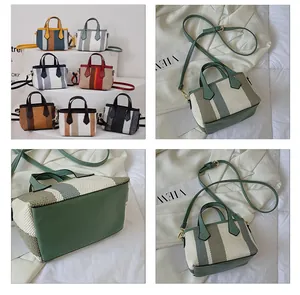 Detail showcase of mini striped woven bucket bags with leather handles in multiple colors