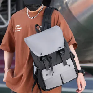 Detailed view of durable nylon fabric and secure buckle closure on the grey backpack