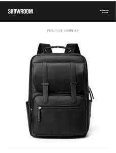 Detailed front view of black textured PU leather backpack with flap and zipper pockets