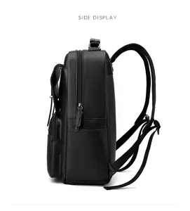 Side view of black faux leather backpack showing lychee grain texture and padded straps