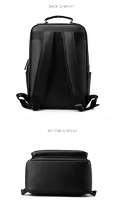 Rear and bottom view of black leather business backpack with luggage strap and padding