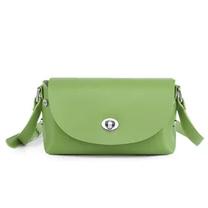 Minimalist grass green leather small crossbody square bag with oval silver twist lock