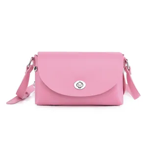 Chic pink leather crossbody bag for women with silver rotating buckle and thin shoulder strap