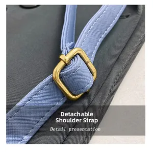 Detail of light blue detachable canvas strap with adjustable golden square buckle