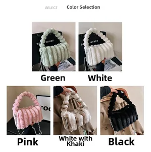 Detail view of plush faux fur handbags with pleated texture in five vibrant colors