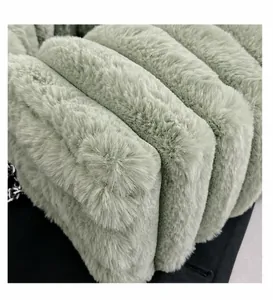 Detail shot of fruit green faux fur bag featuring multi-layer structure and chain strap