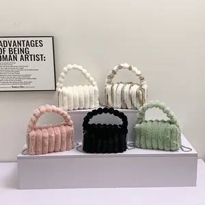 Chic faux fur handbags in five colors with textured stripes and metal chain straps
