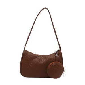 Brown woven texture underarm shoulder bag with a small matching round coin purse pendant
