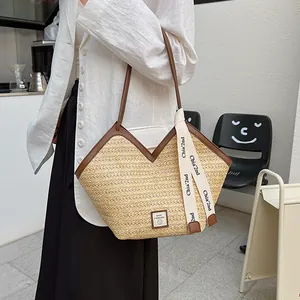 Retro large capacity woven straw tote bag with brown leather straps and fashion label