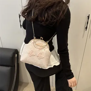 Vintage lace crossbody bag with butterfly embroidery and elegant gold chain strap