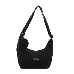 Minimalist black crescent oxford tote bag with adjustable wide strap and coin purse