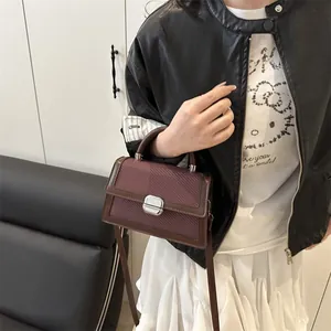 Vintage burgundy crossbody square bag with diagonal texture and silver metal lock