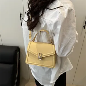 Minimalist light yellow PU leather crossbody square bag with top handle for women