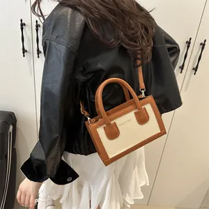 Vintage mini tote crossbody bag in brown leather and off-white canvas patchwork style