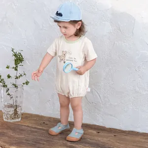 Short sleeve baby cotton bodysuit with cartoon dog, blue cap, and shoes for summer wear