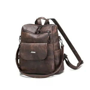 Side view of dark brown vintage leather backpack with magnetic flap pocket and zipper