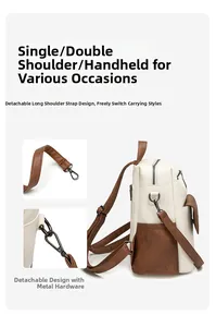 Detail of silver-tone hardware buckles and adjustable strap on the bicolor backpack