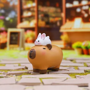 Cute resin capybara figurine with small white rabbit detail for desktop decoration